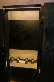 Shackes connected to the "cot" in the solitary confinement cell. It sloped downward so the prisoner's head was lower than his or her feet. Brutal.